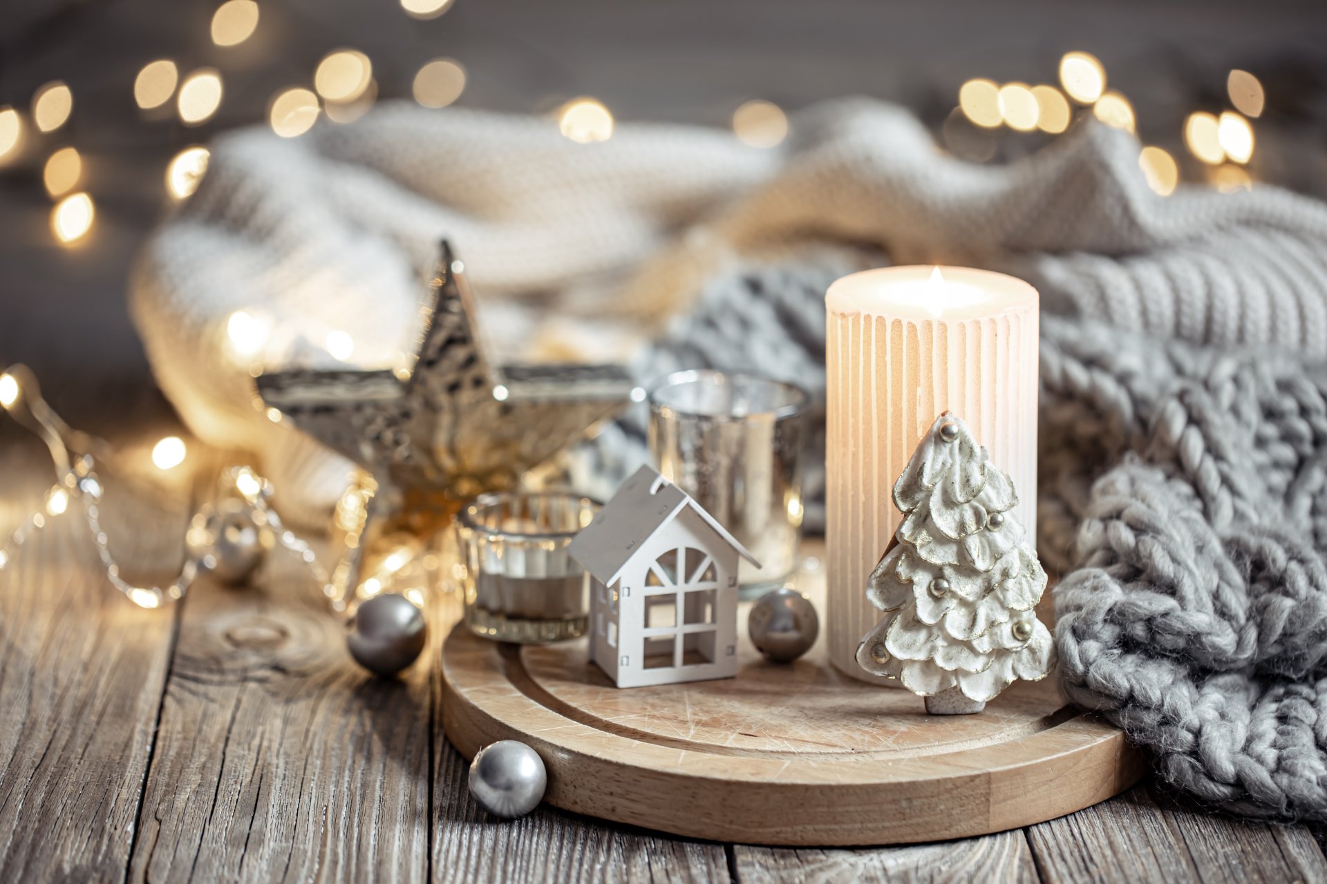Cozy winter composition with decor details on blurred background with bokeh. Cozy winter composition with decor details on blurred background with bokeh.