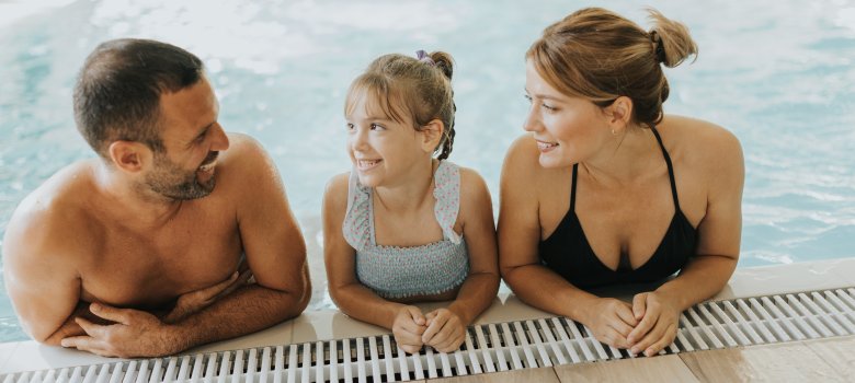 Family in the indoor swimming pool Family in the indoor swimming pool
